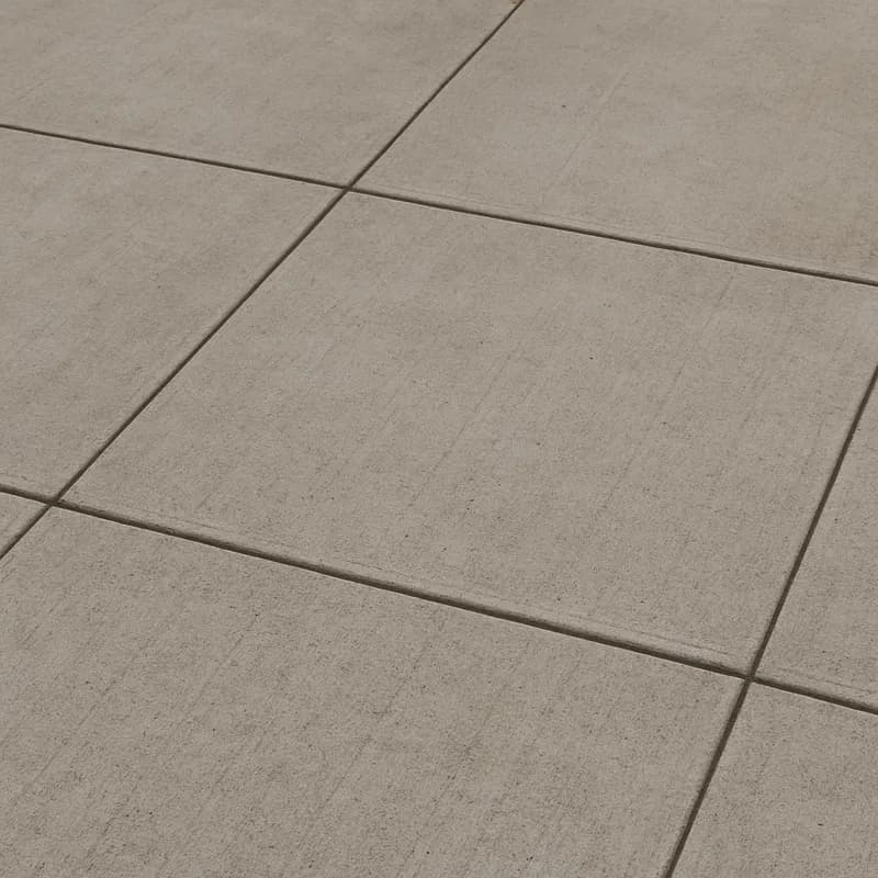 Square concrete paving slabs laid with tight joints